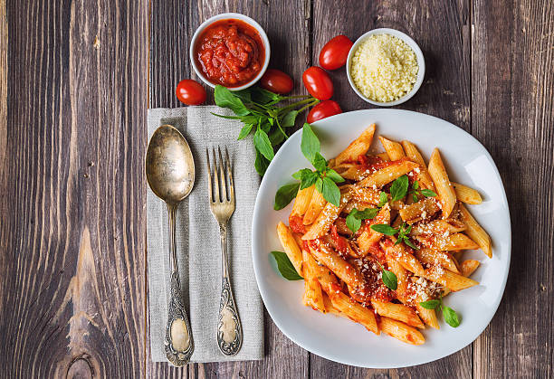 istock Penne pasta in tomato sauce 508759934