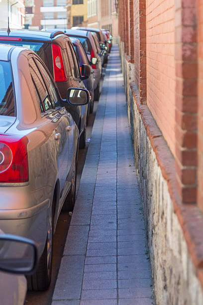 istock narrow sidewalk where a person can not be almost 508783953