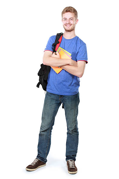 istock Young male student with books 508784619