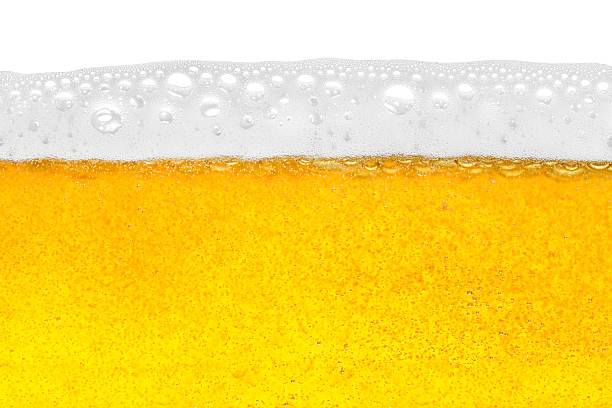 beer close-up beer in close-up shot frothy drink stock pictures, royalty-free photos & images