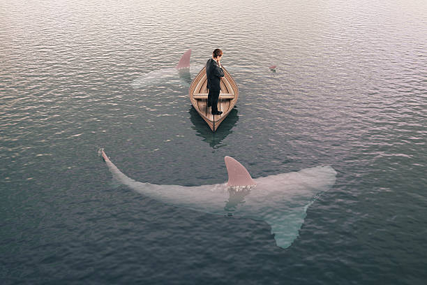 istock businessman and sharks 508787536
