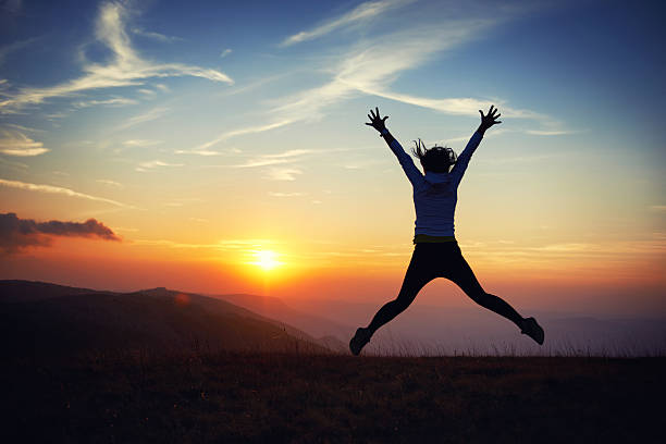 istock Young woman at sunset 508787866