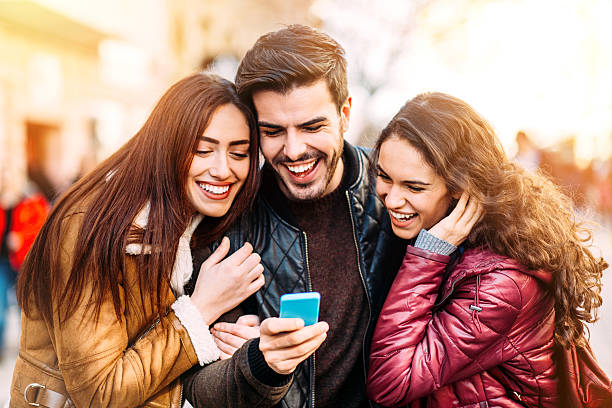 istock Young people texting outdoors 508787944