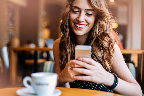 istock Beautiful young woman with a mobile phone 508788112