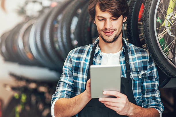 istock Bike shop owner with a tablet 508788182