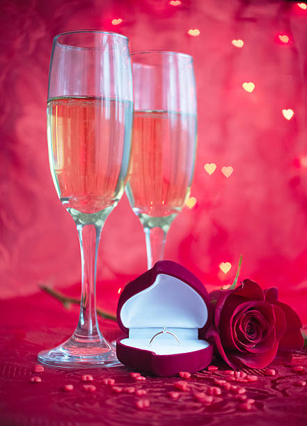 istock Romantic setup with champagne, rose and engagement ring 508788760