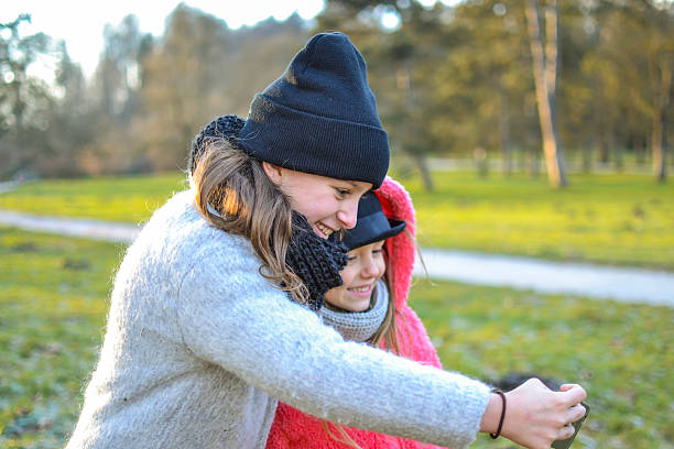 istock Two little girls making selfie 508790122