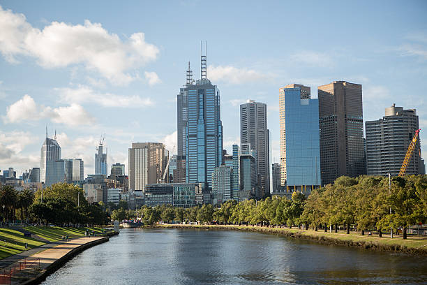 Looking towards the Melbourne CBD along the Yarra River Looking towards the Melbourne CBD along the Yarra River on a beautiful day. yarra river stock pictures, royalty-free photos & images