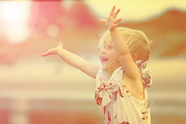 istock Cute little girl on the beach 508811384