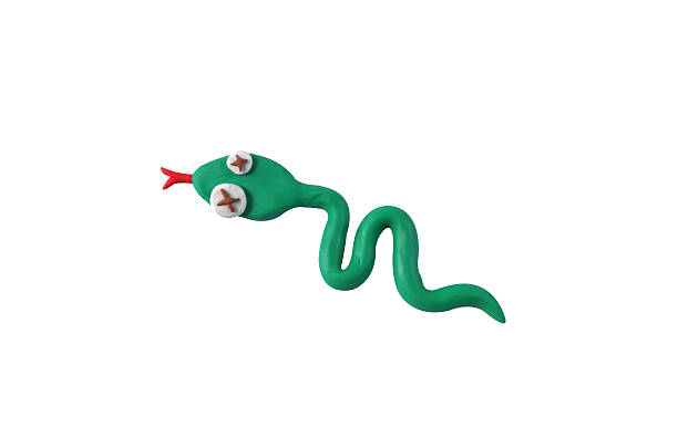 istock miniature snake model from japanese clay 508813306