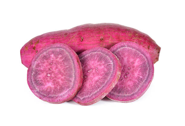 istock whole and sliced sweet potato on white background 508814104