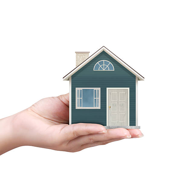 istock holding house representing home ownership 508816202