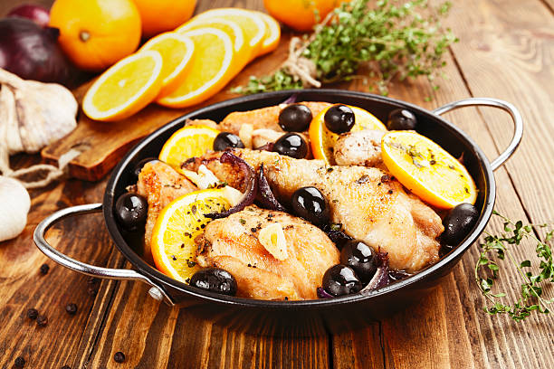 Chicken with oranges and olives stock photo