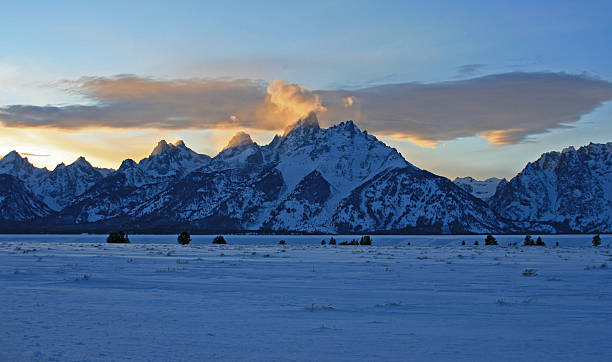 istock Grand Tetons Sunlit Lenticular Cloud Twilight Sunset 508816824