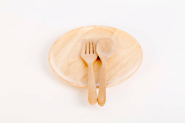 istock Empty wooden plate and spoons, forks 508817242