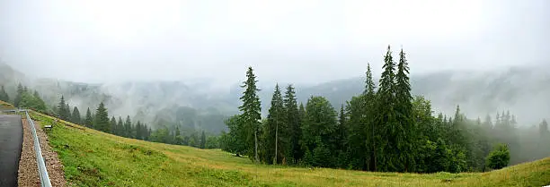 view of the transrarau road in the mountains in a cloudy day