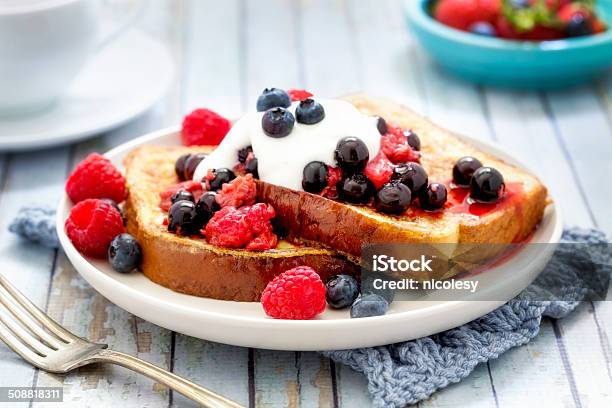 French Toast With Berries And Yogurt Stock Photo - Download Image Now - Yogurt, Toasted Bread, French Toast