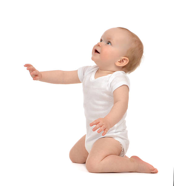 istock Infant baby toddler sitting hand pointing 508818759