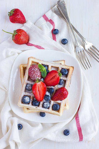 istock belgian waffles with fresh berries 508818834