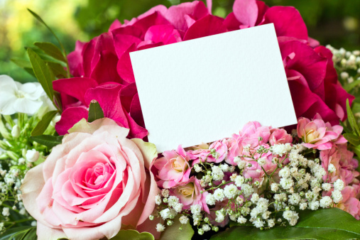 flowers with a white card for a message