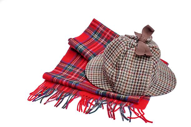 istock Deerstalker Cap and Tartan Scarve Isolated On White 508819471