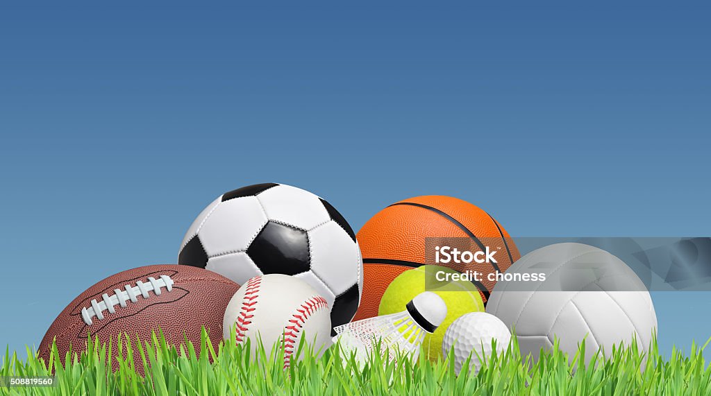 balls balls on a grass field and a blue sky Heap Stock Photo