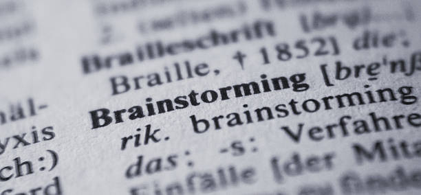 Macro image of dictionary definition brainstorming stock photo