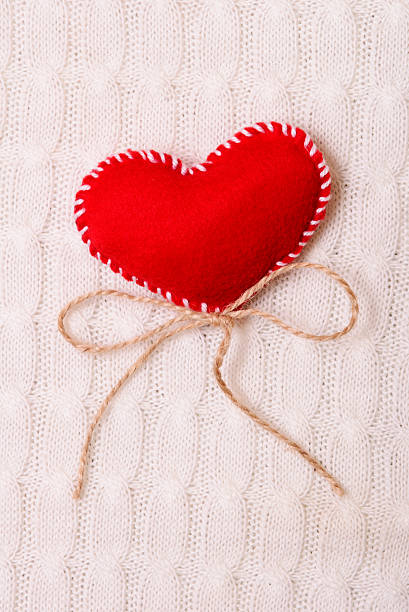 istock Textile red heart on a knitted texture 508820518