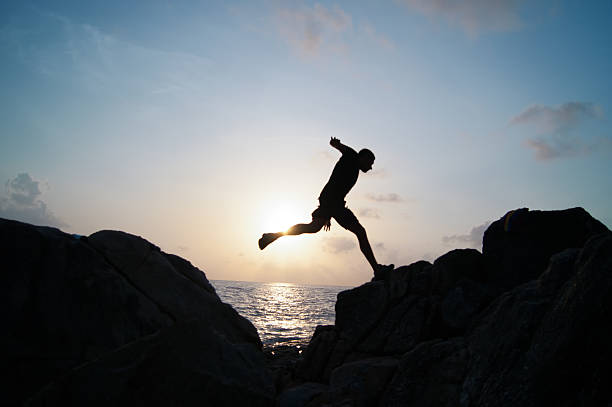 istock The jumping man on rocks 508830834