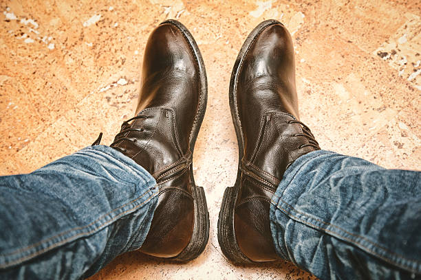 istock legs in jeans and leather boots 508831842