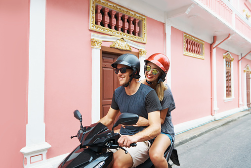 Shot of a young couple going for a ride on a scooter togetherhttp://195.154.178.81/DATA/i_collage/pu/shoots/806308.jpg