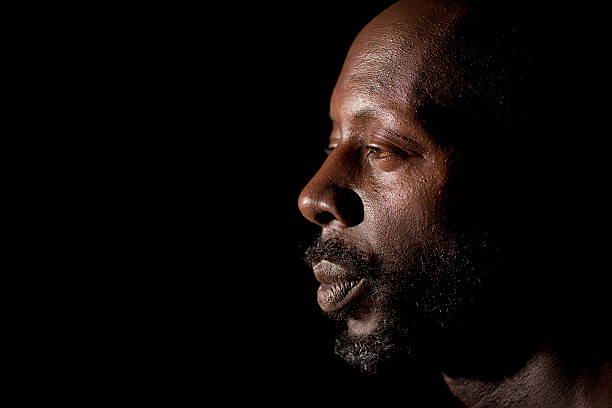 Portrait Of Black Man In Profile stock photo