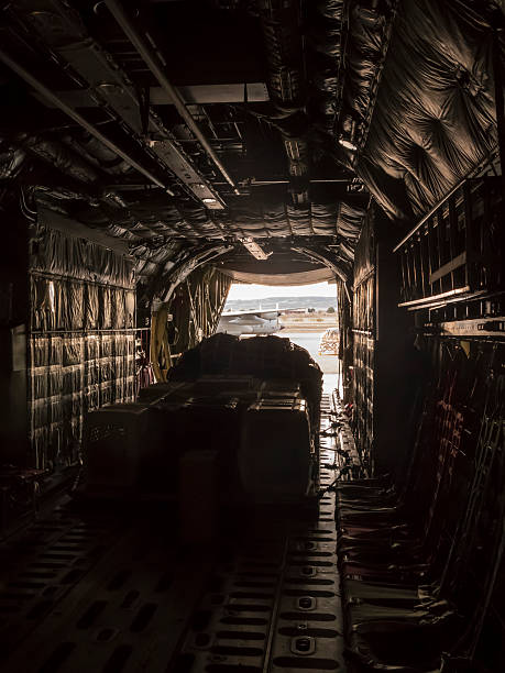 Inside the cargo plane Photograph taken from inside a cargo hold of a Hercules plane vehicle interior audio stock pictures, royalty-free photos & images