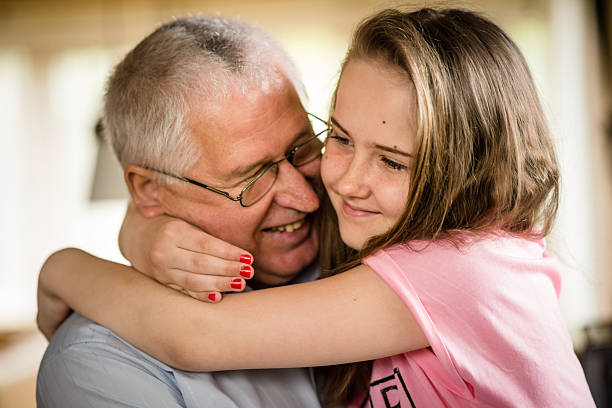 istock Grandfather and granddaghter hug 508837044