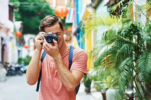 istock Capturing every moment of his holiday 508837058