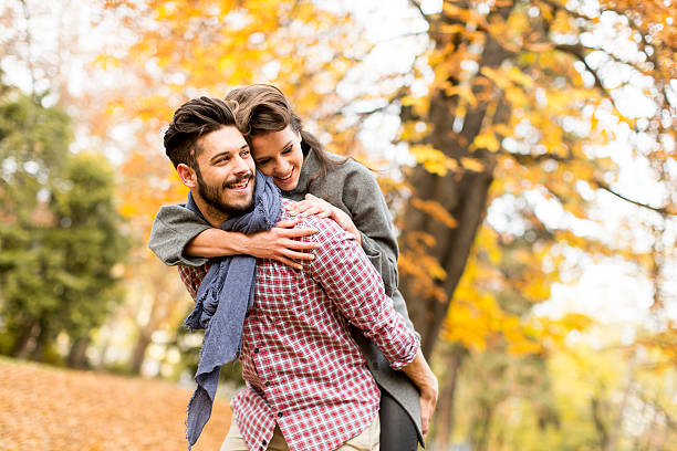 istock Young couple in the autumn forest 508837322