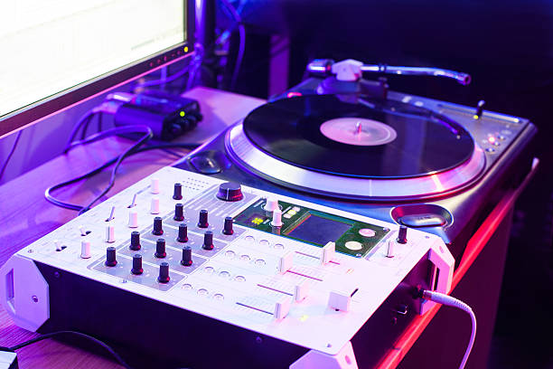 istock Dj vinyl player and mixer in studio 508839042