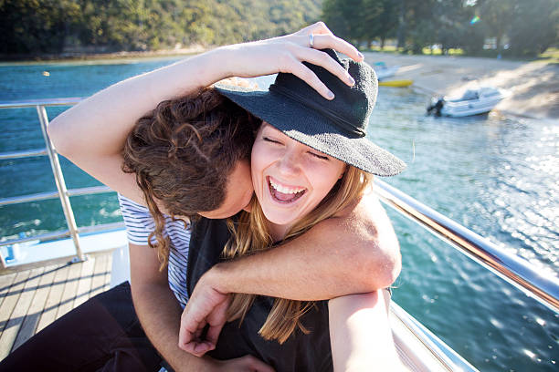 istock Young couple laughing taking selfie on boat deck in Sydney 508840586