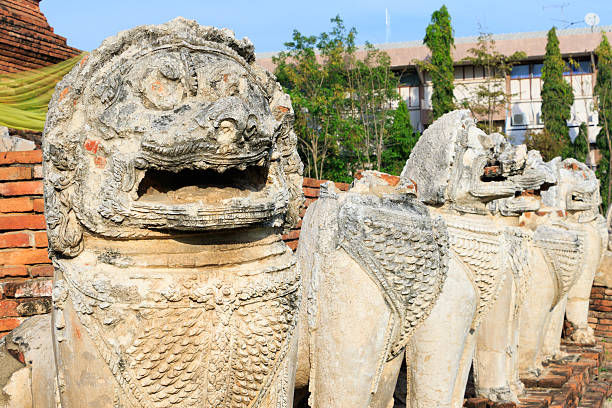 istock Antique Stupa surrounded by Lion statue cambodia style 508853628