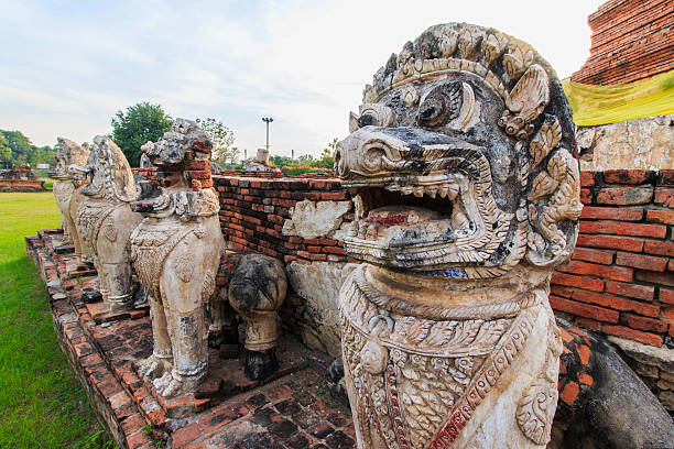 istock Antique Stupa surrounded by Lion statue cambodia style 508854114