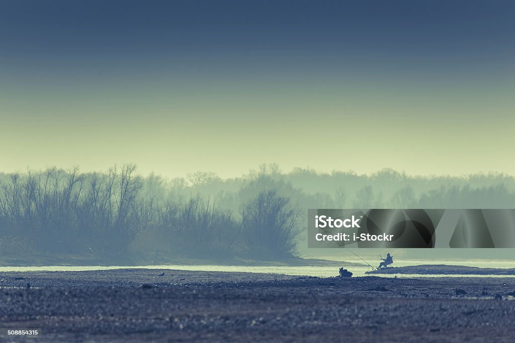 Fisherman Fisherman on the beach of the lake 50-54 Years Stock Photo