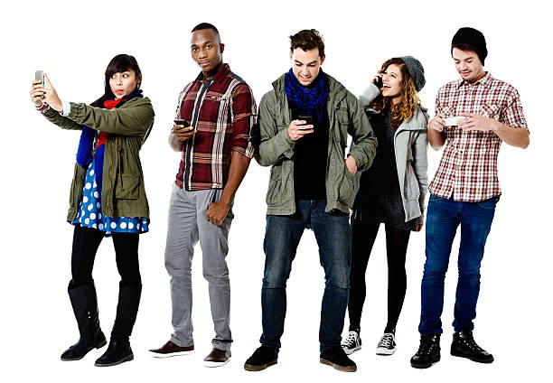 istock Five happy young people busy with cellphones 508855401