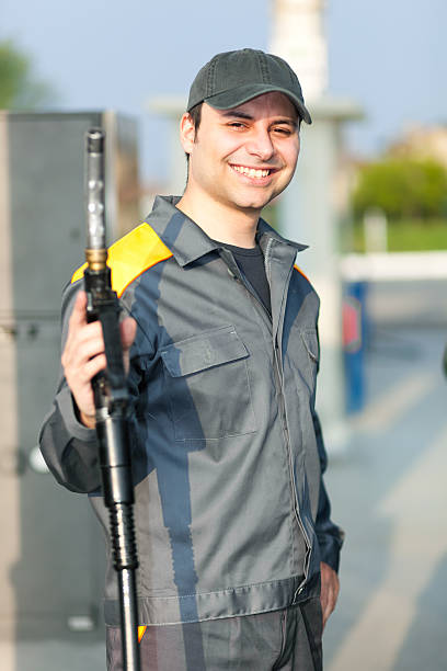 istock Smiling gas station worker 508855537
