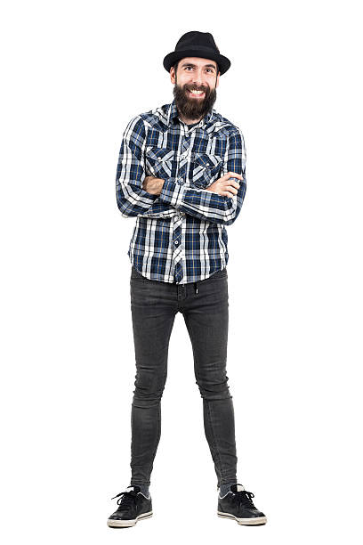 istock Laughing hipster wearing fedora hat with crossed arms 508856620
