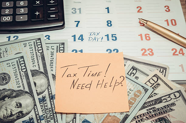 istock Tax Time! calendar with dollar and pen. toned image 508857236
