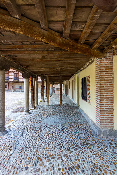 istock Typical stone columns supporting wooden and brick houses in Arev 508859367