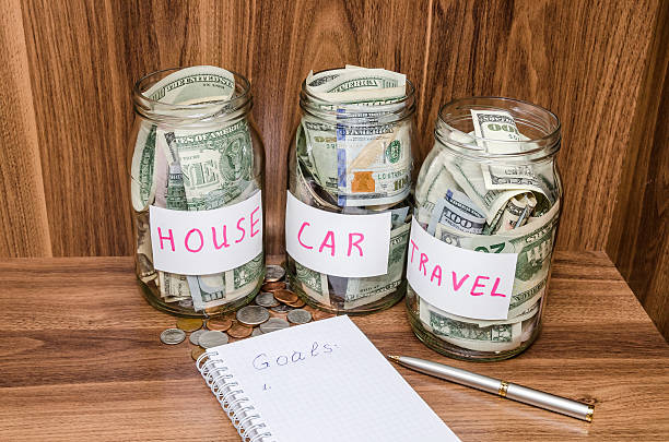 istock finance idea - new years resolutions with dollar coins 508859586