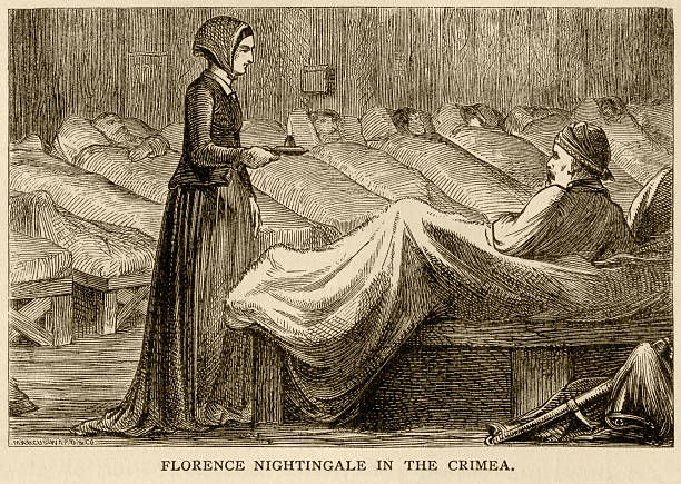 Florence Nightingale in the Crimea Florence Nightingale working at Scutari military hospital in the Crimea, during the Crimean War (1853-56). From “Aunt Charlotte’s Stories of English History for the Little Ones” by Charlotte M Yonge. Published by Marcus Ward & Co, London & Belfast, in 1884. albania photos stock illustrations