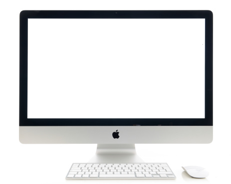 İstanbul, Turkey - July 22, 2014 : Apple iMac 27 inch desktop computer, keyboard a on a white background. iMac displaying blank white screen. iMac produced by Apple Inc.