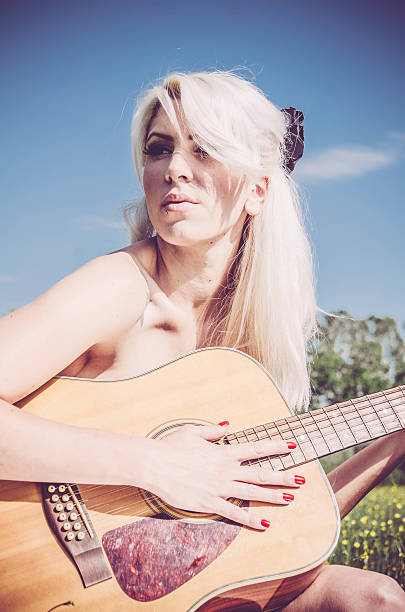 istock Beauty with a Guitar 508861018